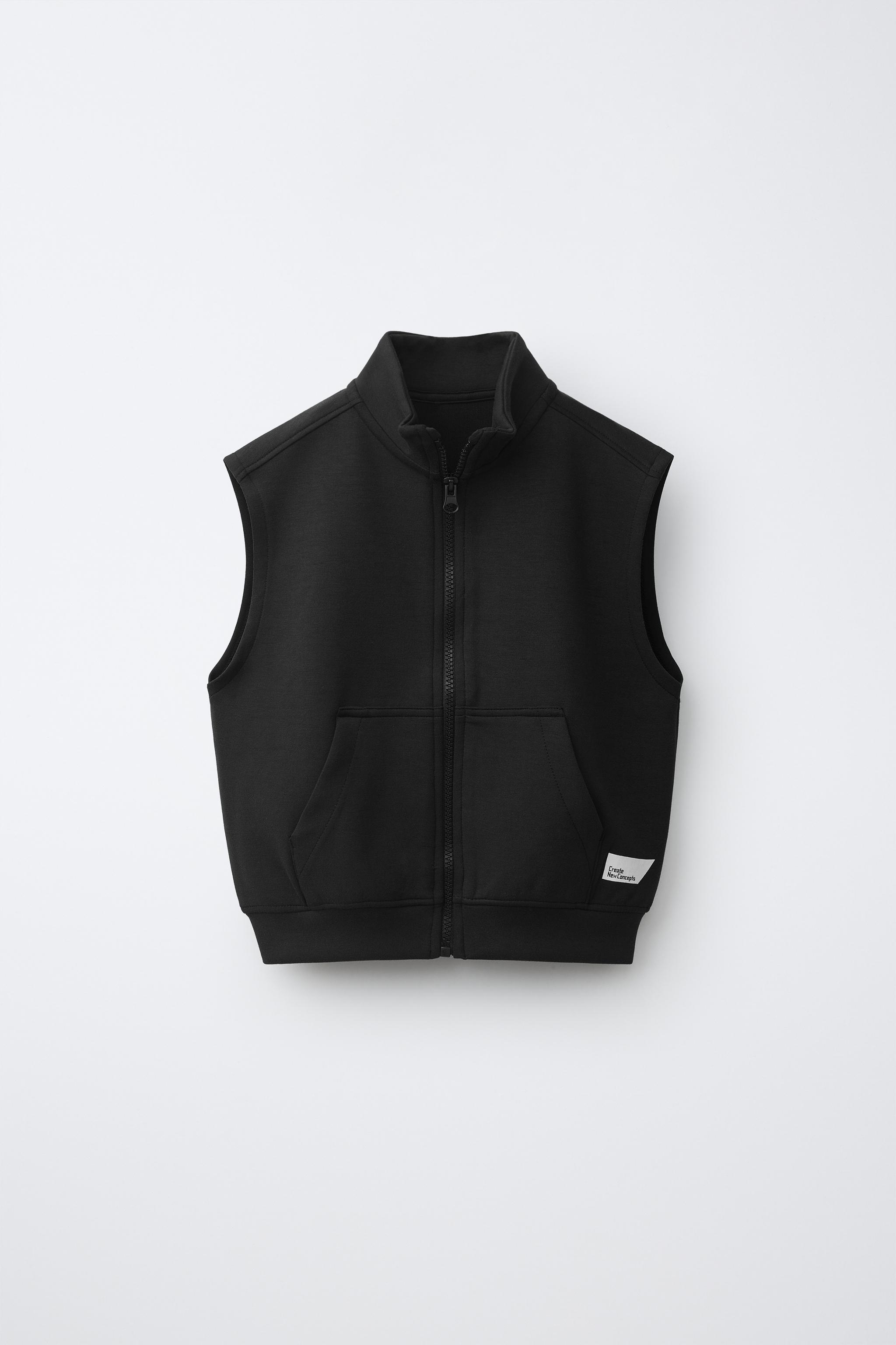 GILET INTERLOCK À ÉTIQUETTE